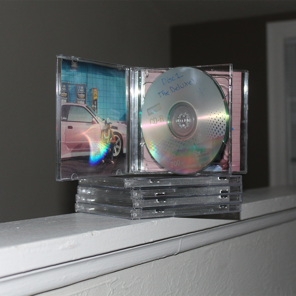 E! Deluxe (Cds)